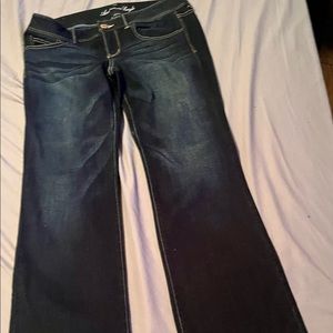 American Eagle Next Level high waste bootcut leggings in indigo blue. Word once